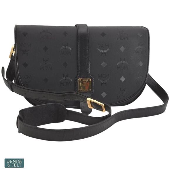 MCM Black Leather Crossbody Bag with Monogram Print & Gold...